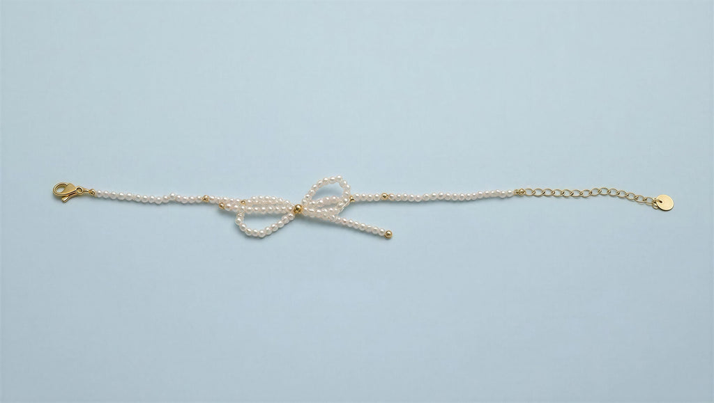 Pulsera perla lazo