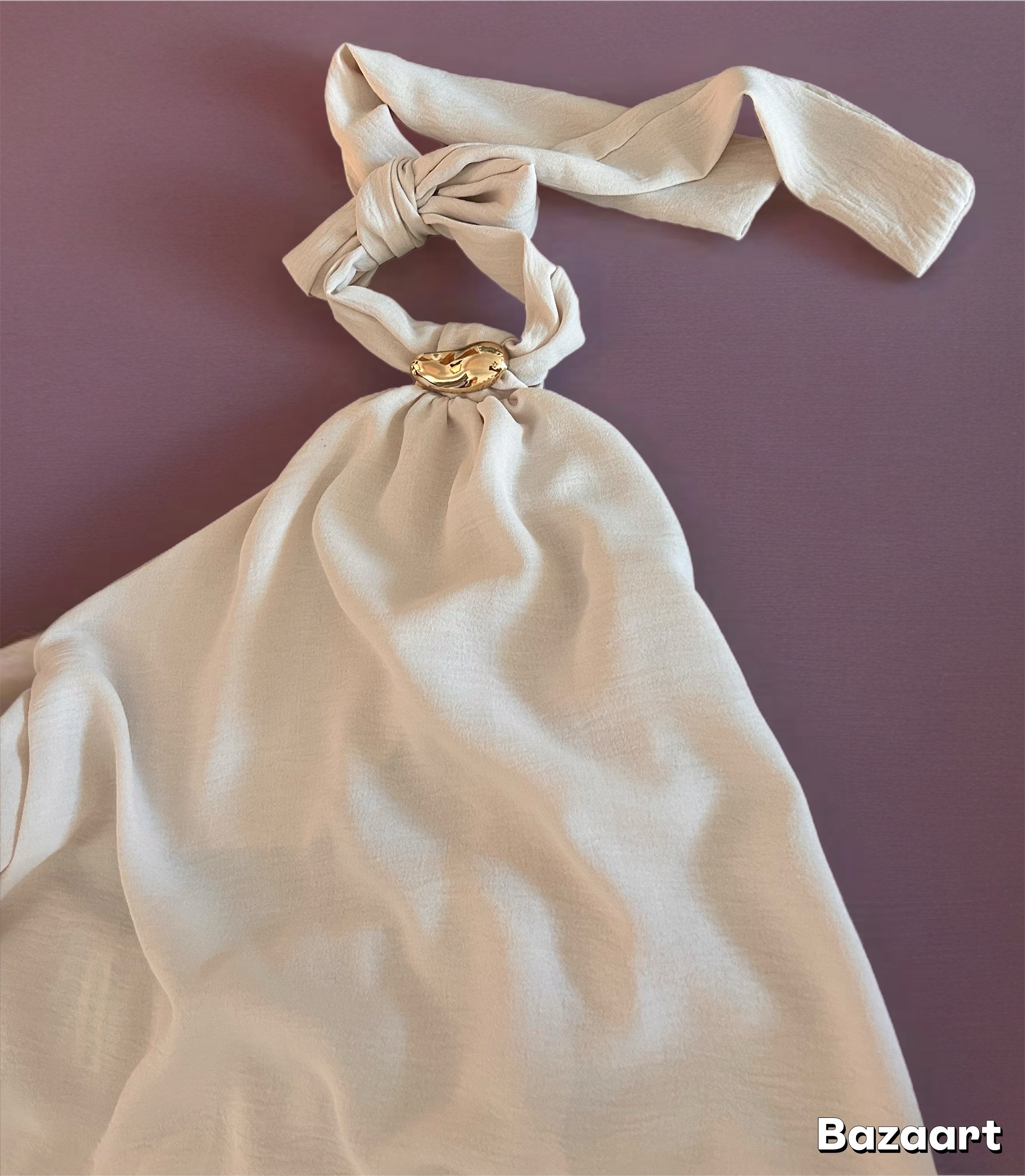 Vestido media pierna con nudo al cuello