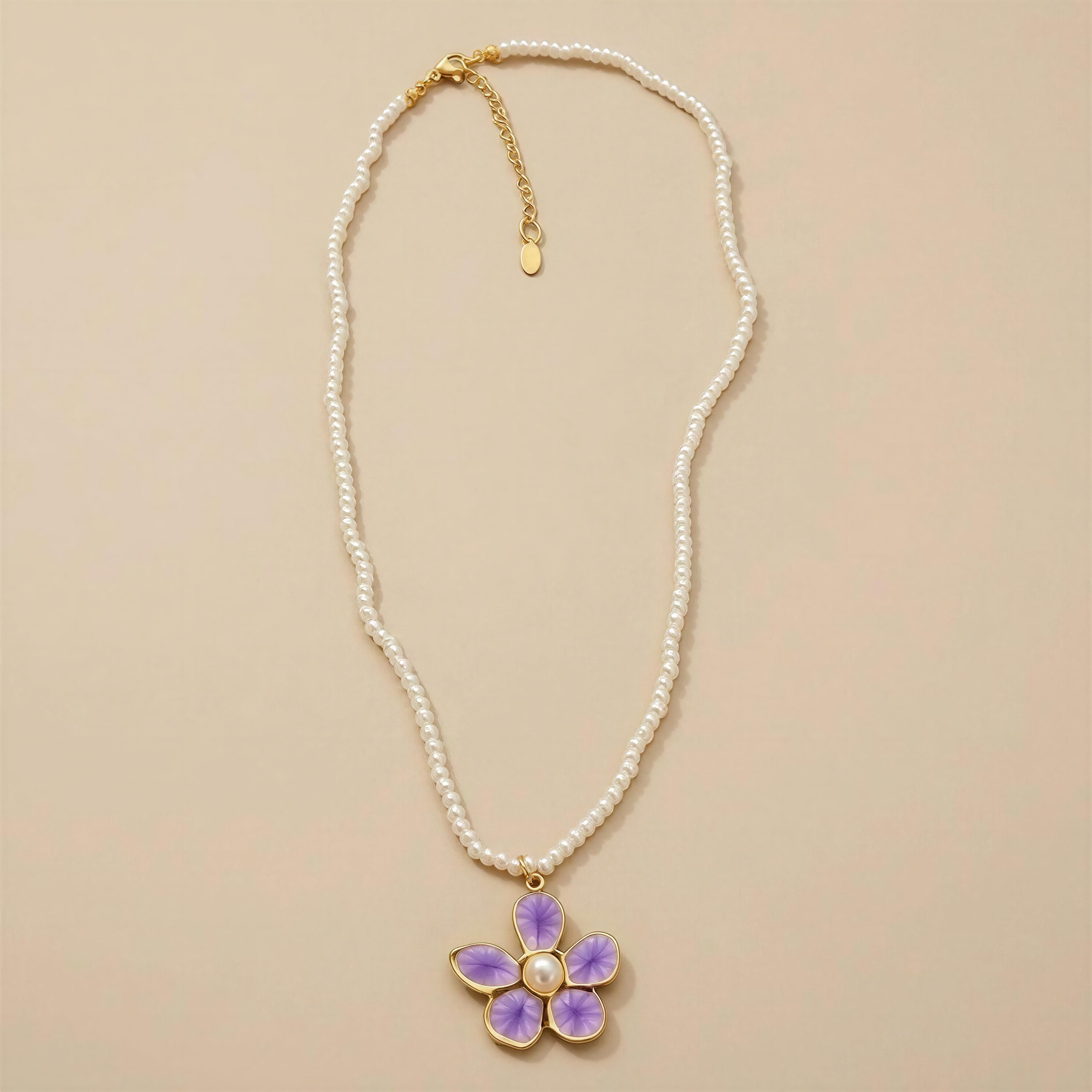 Collar perla con flor esmalte